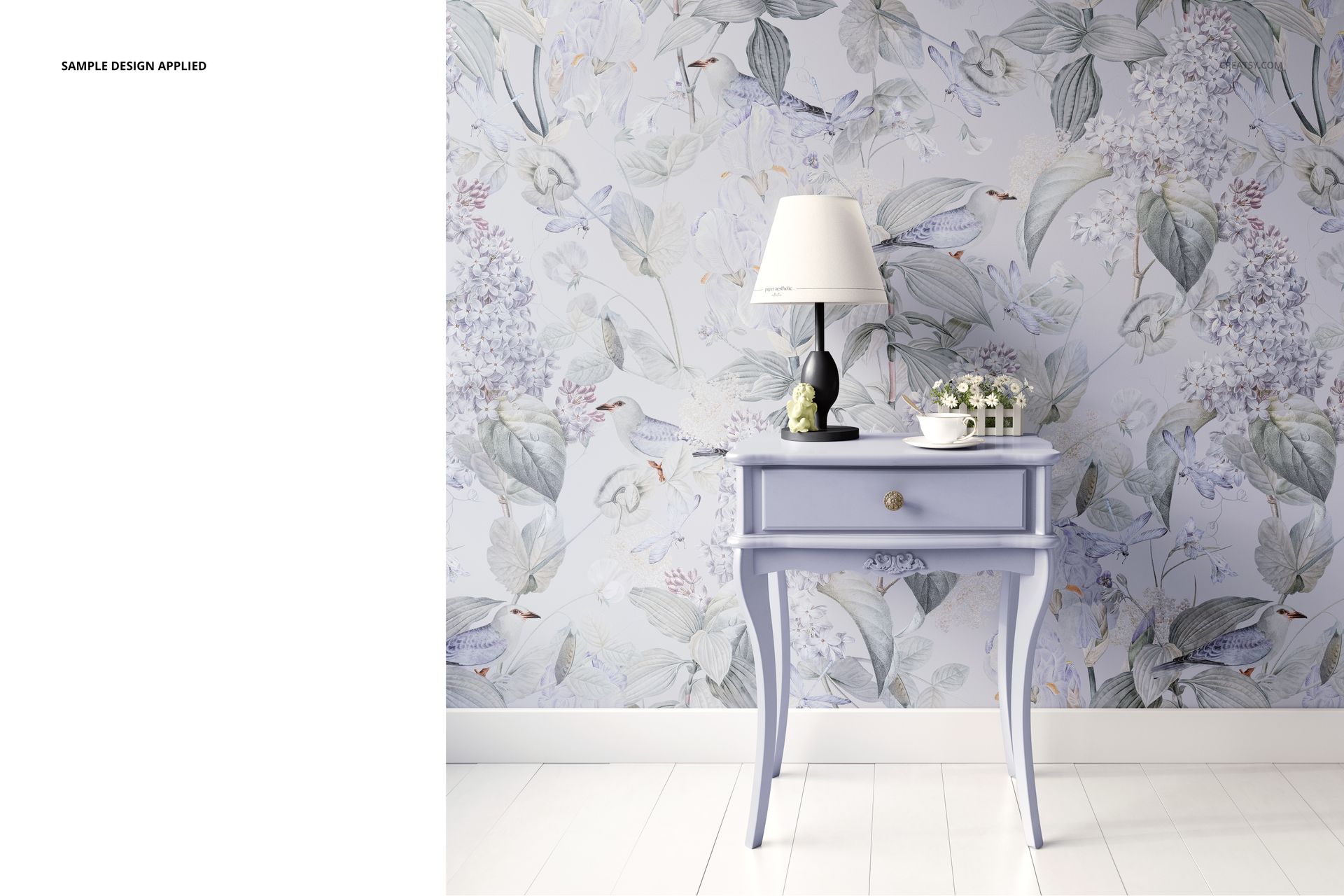 Classic console table mockup featuring a lavender table, lamp, and soft floral wallpaper in a home interior scene.