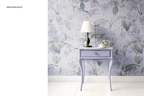 Classic console table mockup featuring a lavender table, lamp, and soft floral wallpaper in a home interior scene.