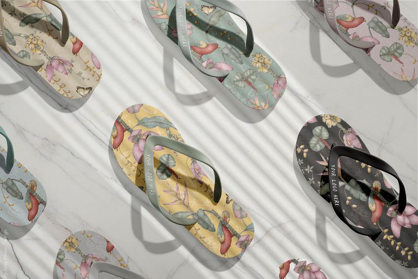 Flip flops mockup set displayed on a white marble surface, featuring various botanical and bird patterns in pastel colors.
