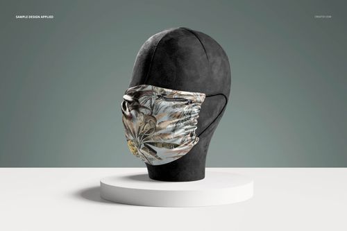 Silk face mask mockup featuring a floral design, shown on a matte black mannequin head against a gray background.