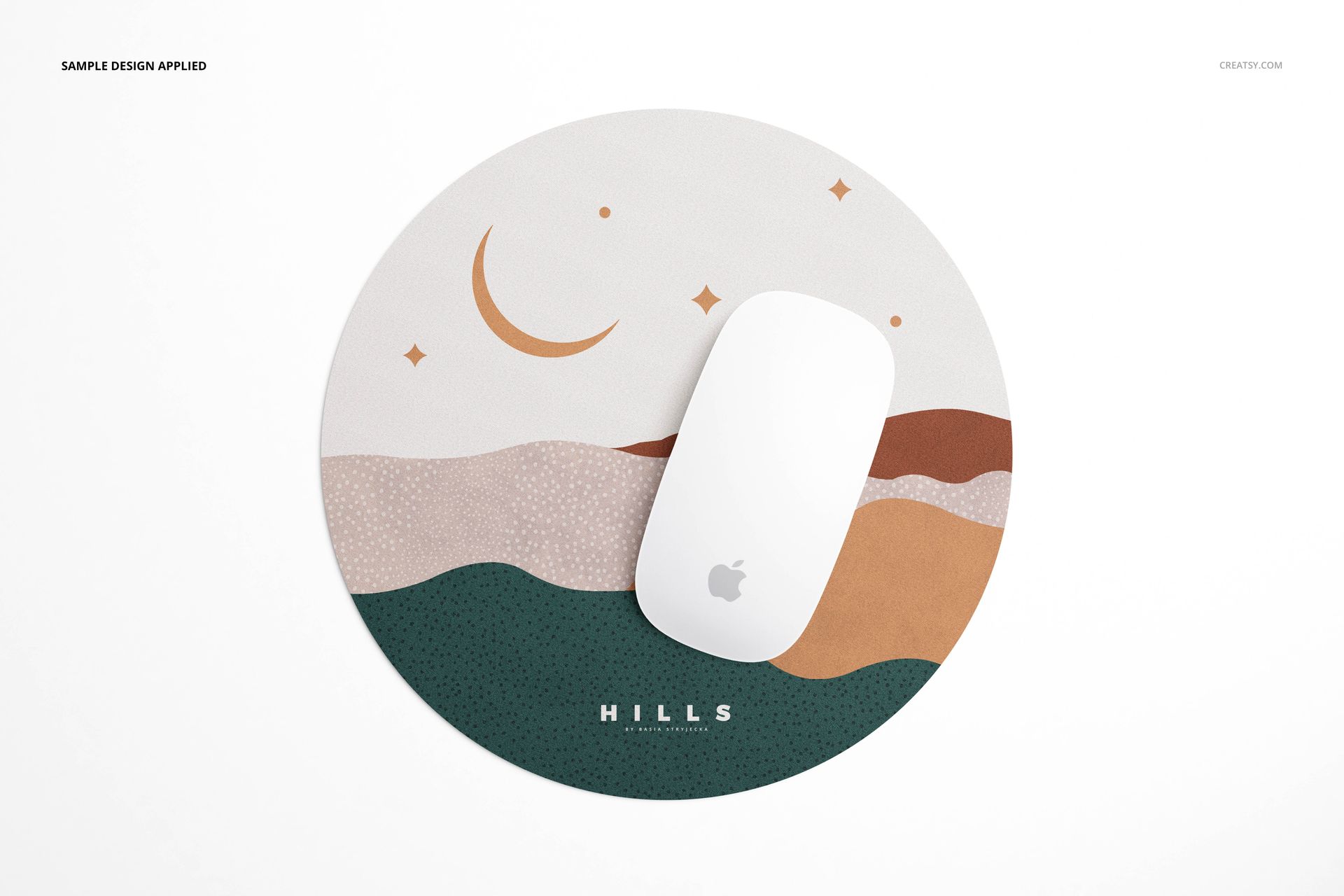 PSD mockup of a round mouse pad displaying a stylized mountain and moon motif in muted colors, accompanied by a wireless mouse.