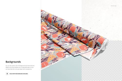 Fabric roll with colorful floral and leaf pattern displayed at an angle on a light surface, PSD mockup scene.