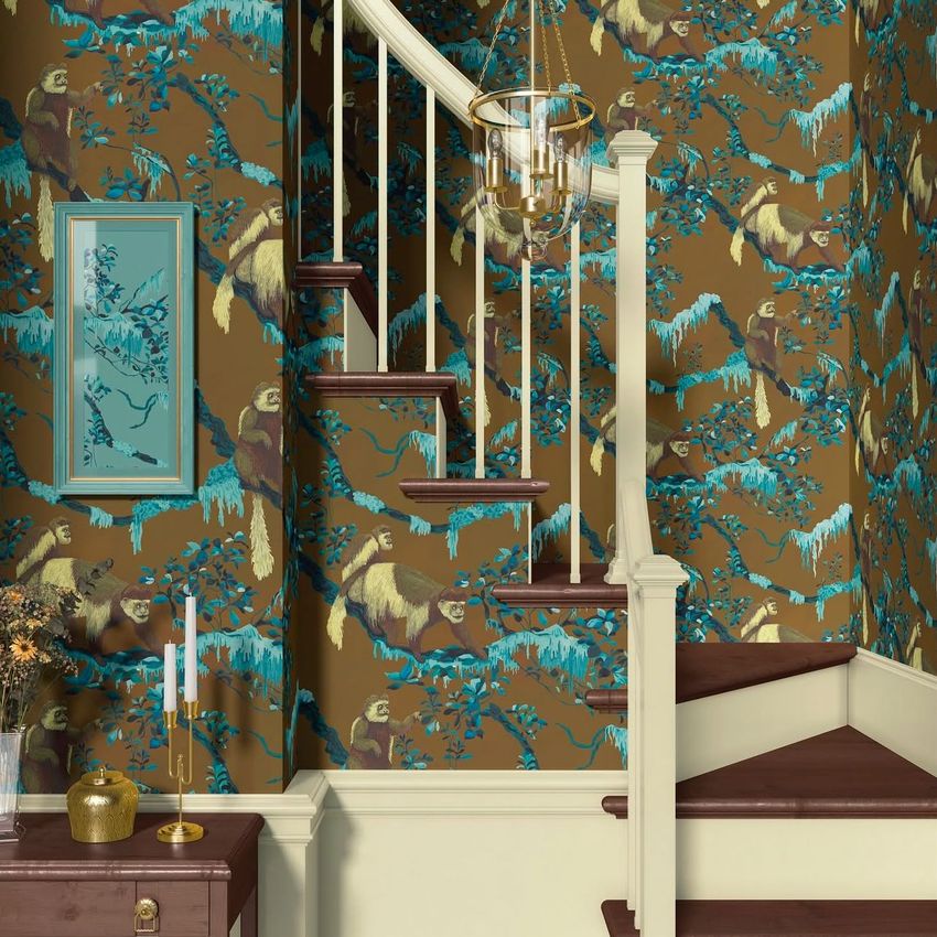 Traditional staircase mockup featuring brown and teal wallpaper with monkeys and foliage, white railing, and dark wood steps.