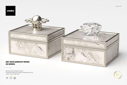 Front view of two art deco jewelry boxes with marble texture and metallic trim, featuring ornate crystal lids.
