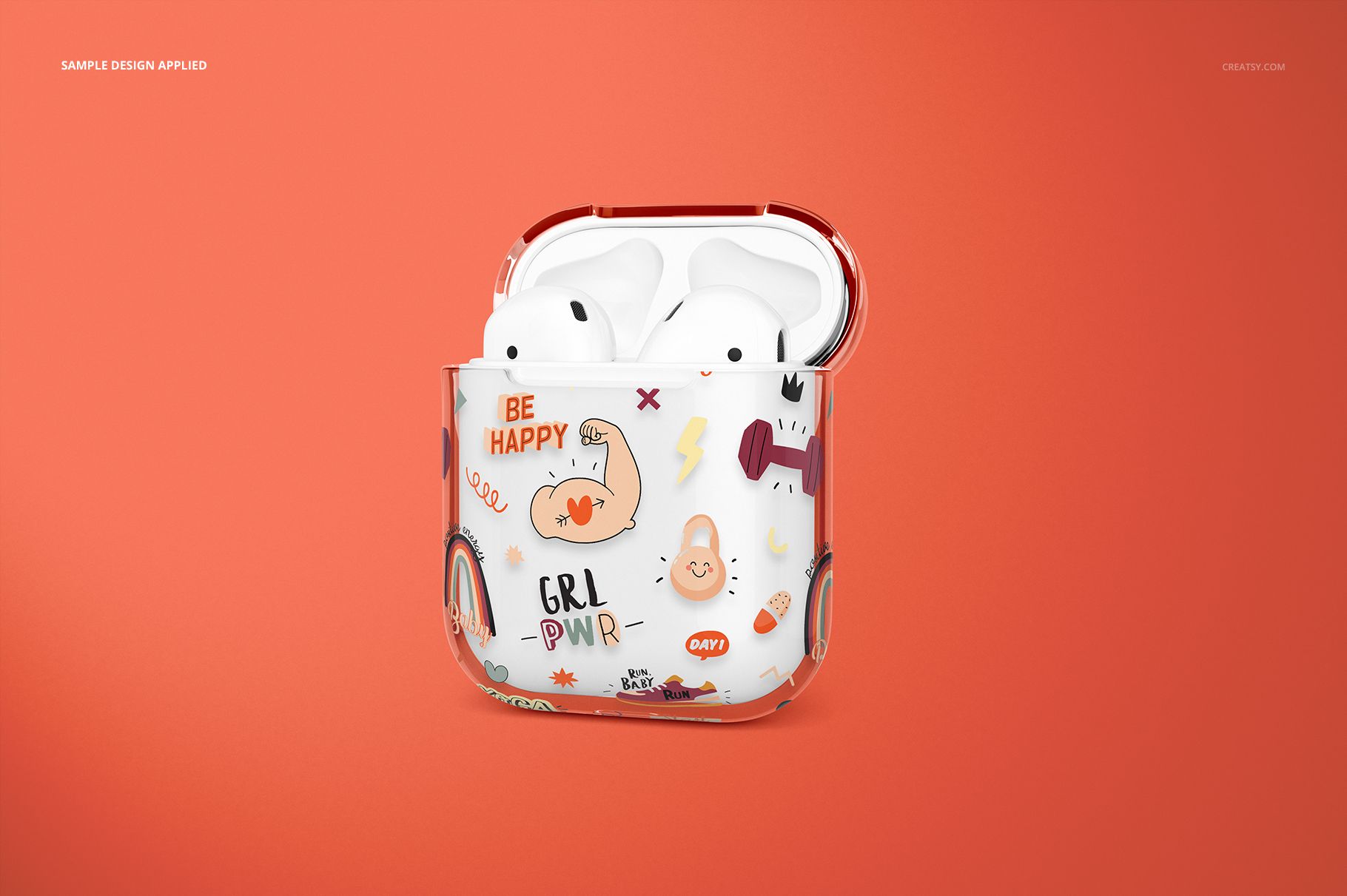 PSD mockup of an AirPods clear case with vibrant doodles and cheerful text, positioned on a solid orange background.