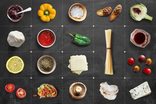 Top view of a wooden board mockup featuring various food ingredients and dishes arranged in a grid pattern.