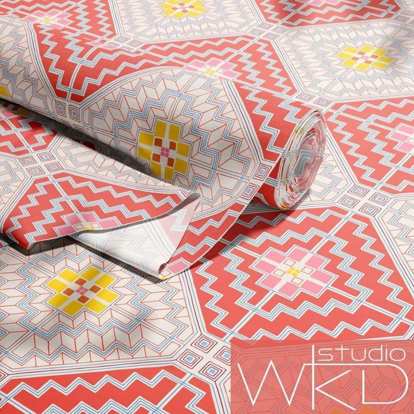 Fabric roll mockup featuring a geometric pattern in red, white, yellow, and blue, displayed on a flat surface with a close-up view.