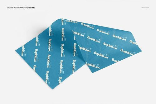 Blue wrapping tissue paper mockup displayed on a white background, viewed from above with sample text design.