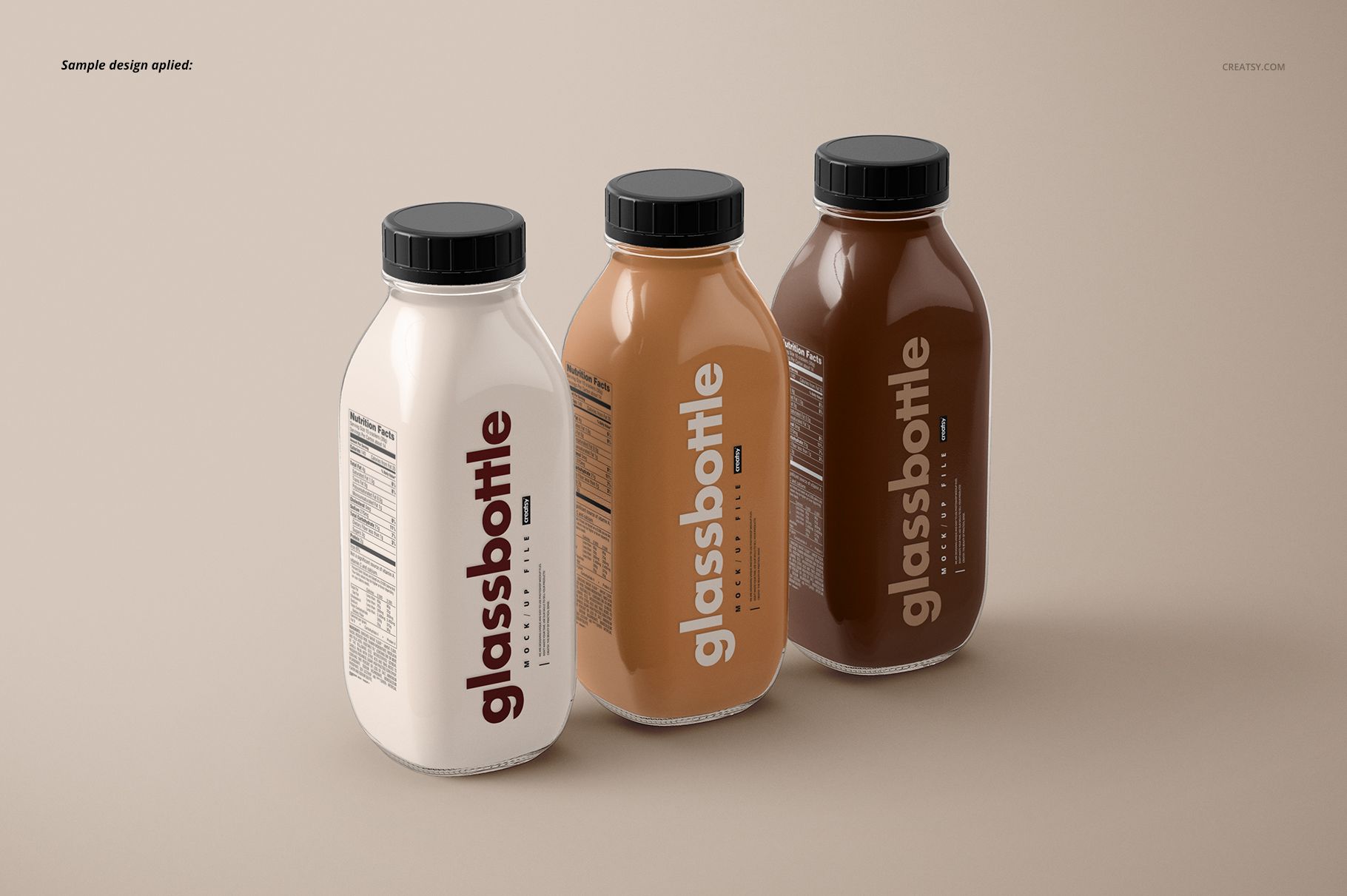 Set of three glass bottles mockup with distinct liquid shades and black screw caps, displayed on a neutral background.