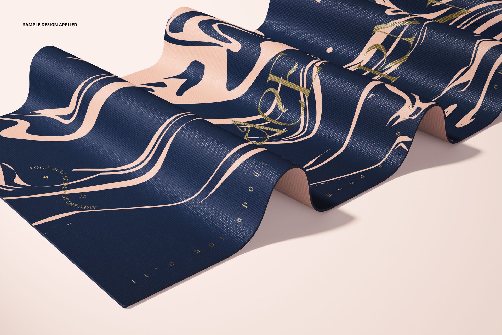 Folded yoga mat mockup featuring a textured surface with flowing beige and navy blue abstract design elements.