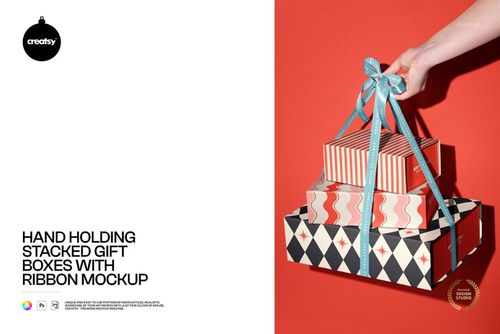 Hand Holding Stacked Gift Boxes with Ribbon Mockup - mockup preview 1