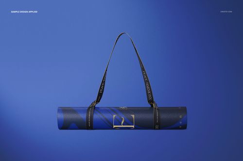 Yoga mat mockup showing a rolled mat with blue geometric design and black straps, set against a plain blue backdrop.