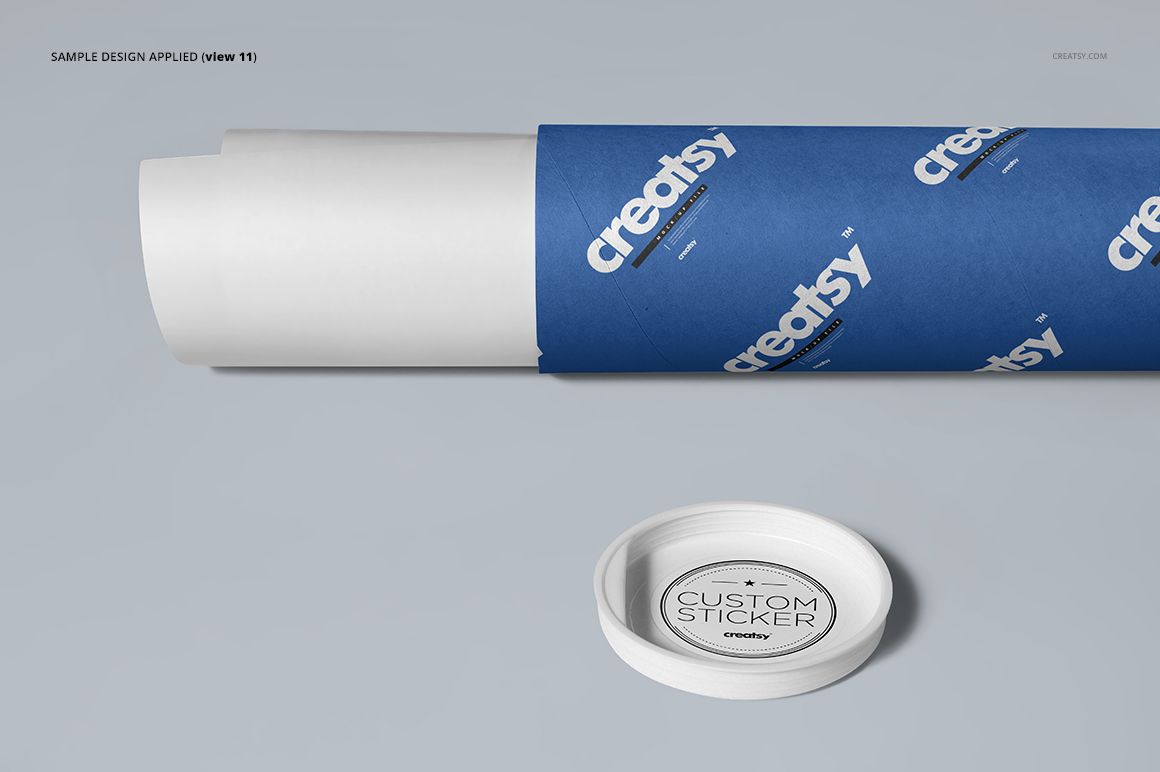 Mailing tube mockup with a blue wrapper featuring white text, shown in a side view with a round white cap nearby.