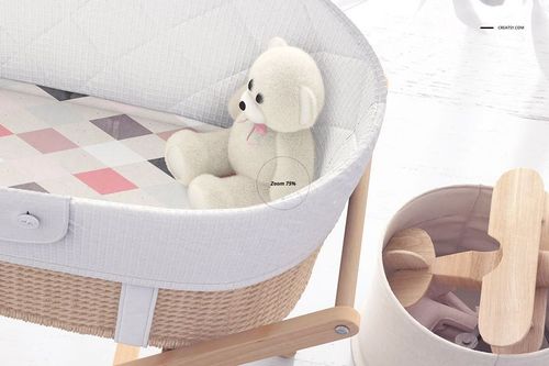 Bassinet liner mockup with a quilted white fabric, geometric patterned mattress, and plush teddy bear, shown from above.