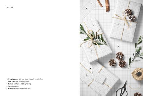 PSD mockup showing Christmas gifts in rectangular boxes, wrapped in grid paper with natural olive branches and pinecones.