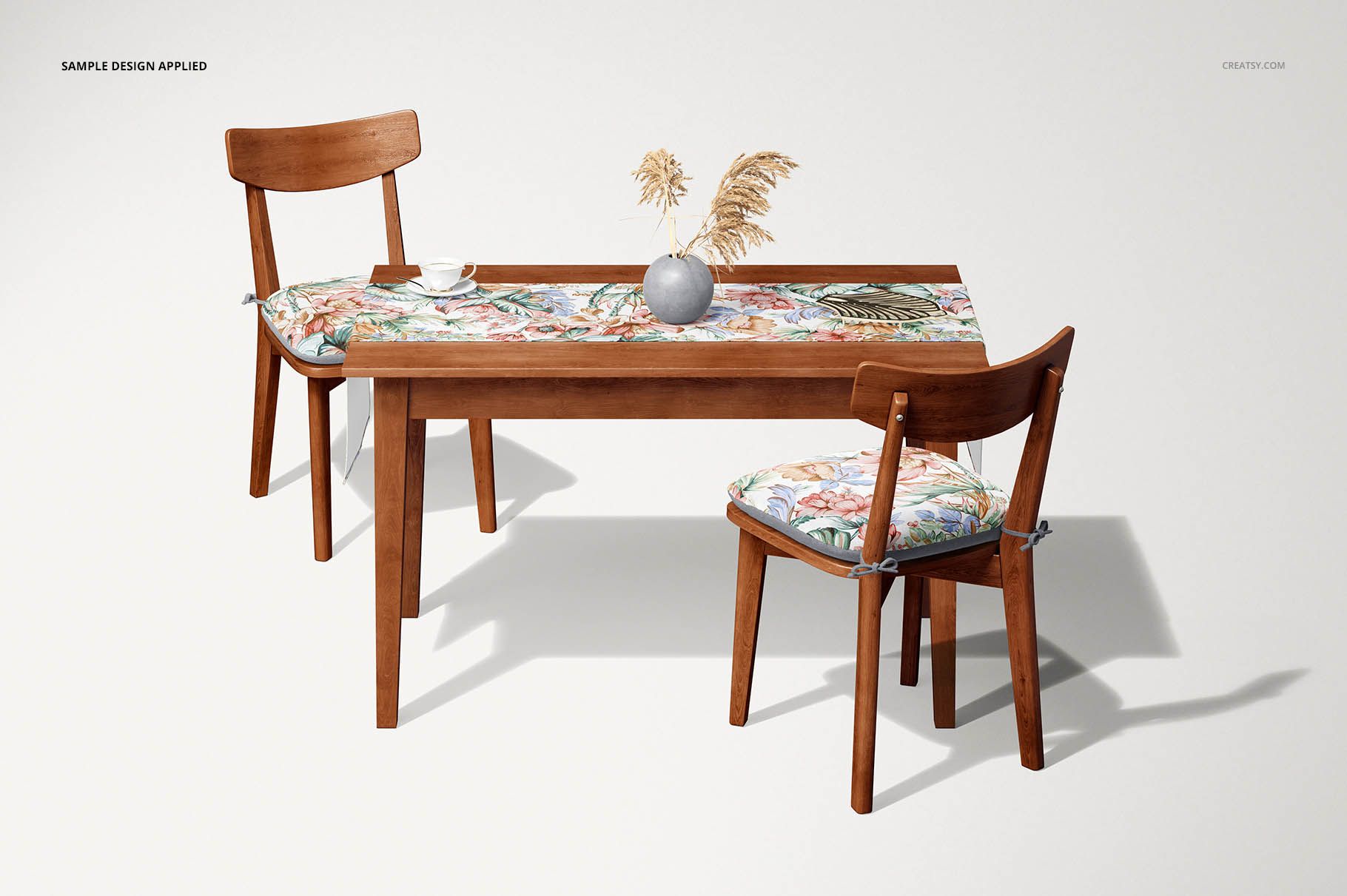 Front view of a 40x180cm table runner mockup with vibrant botanical design, styled with chairs and neutral decor.