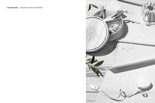 Top view of a cotton fabric and embroidery kit mockup with sewing tools, embroidery hoop, and leaves on a wooden surface.