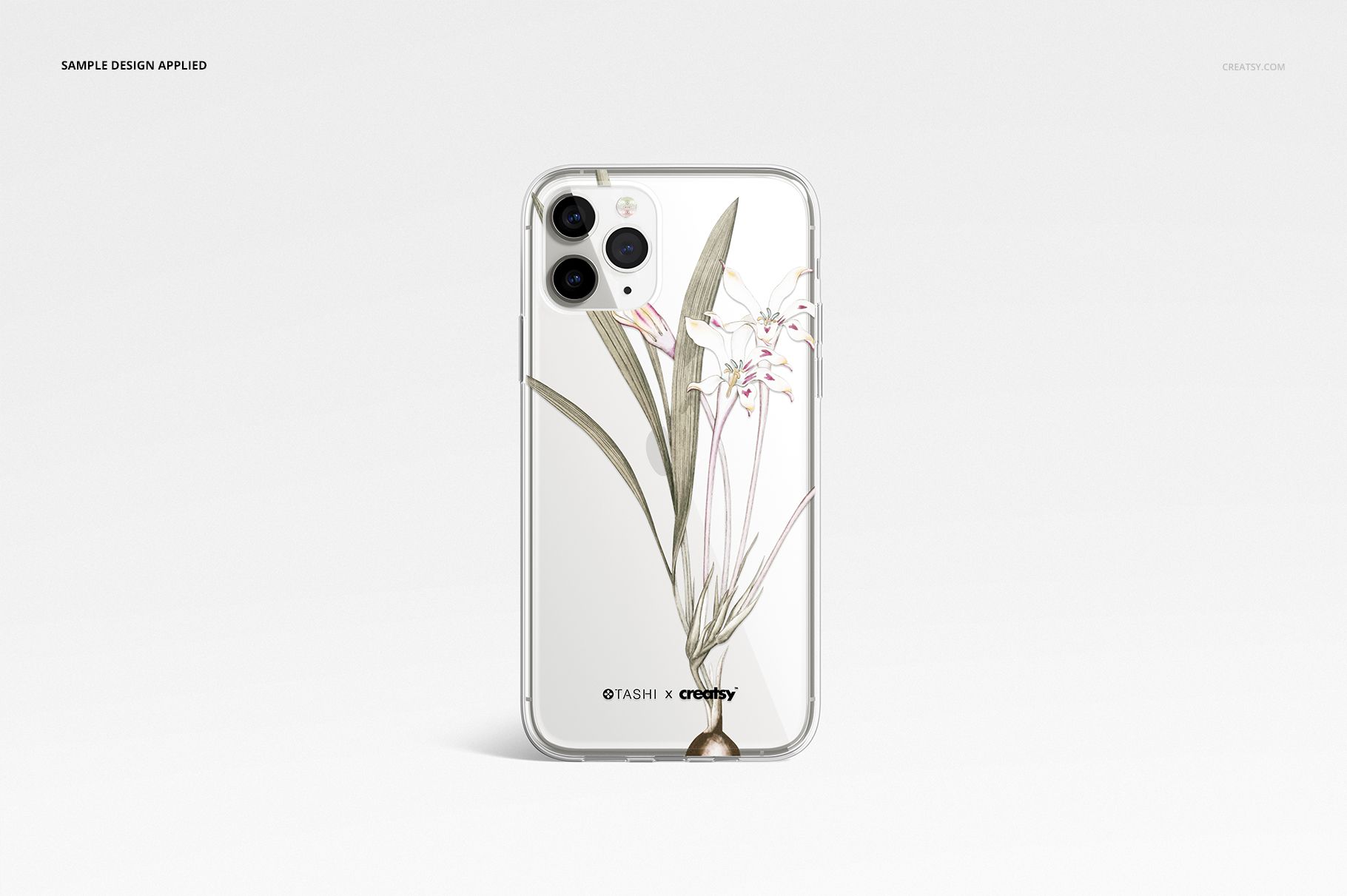 iPhone 11 Pro clear case mockup featuring a delicate floral design, displayed upright on a minimal white surface.