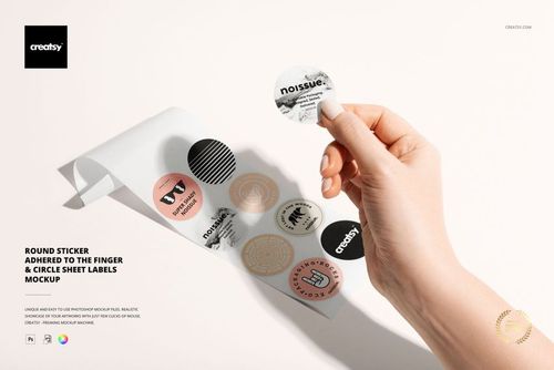 Round sticker mockup showing a hand and a sheet of circular labels with multiple graphic designs and soft color palette.