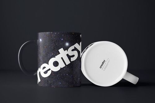 Mug mockup set featuring a glossy black mug with a star pattern and white logo, next to a mug with a visible underside.