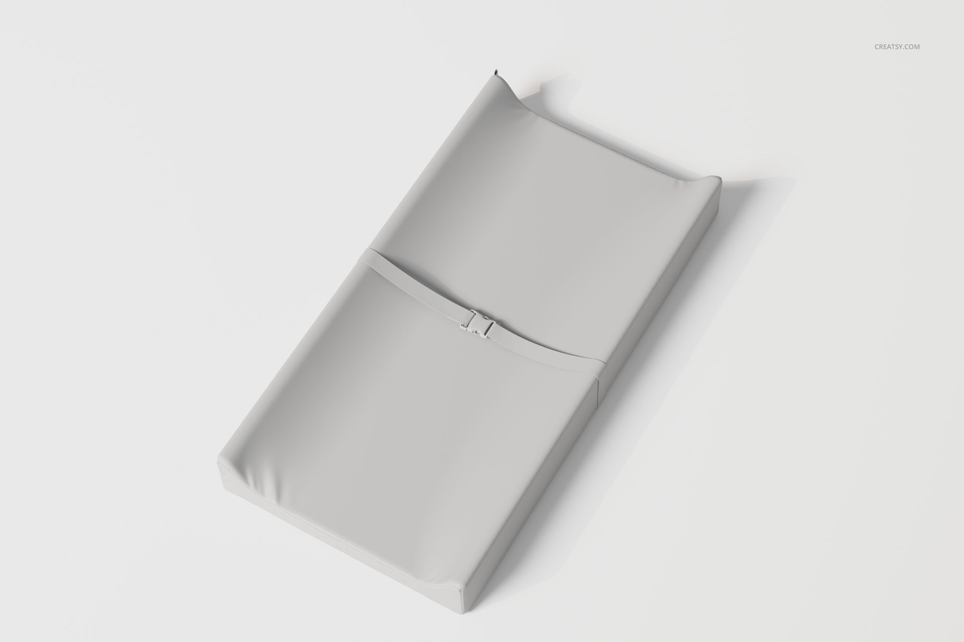 Contoured changing pad in light gray color, shown from an angled top view on a plain white background.