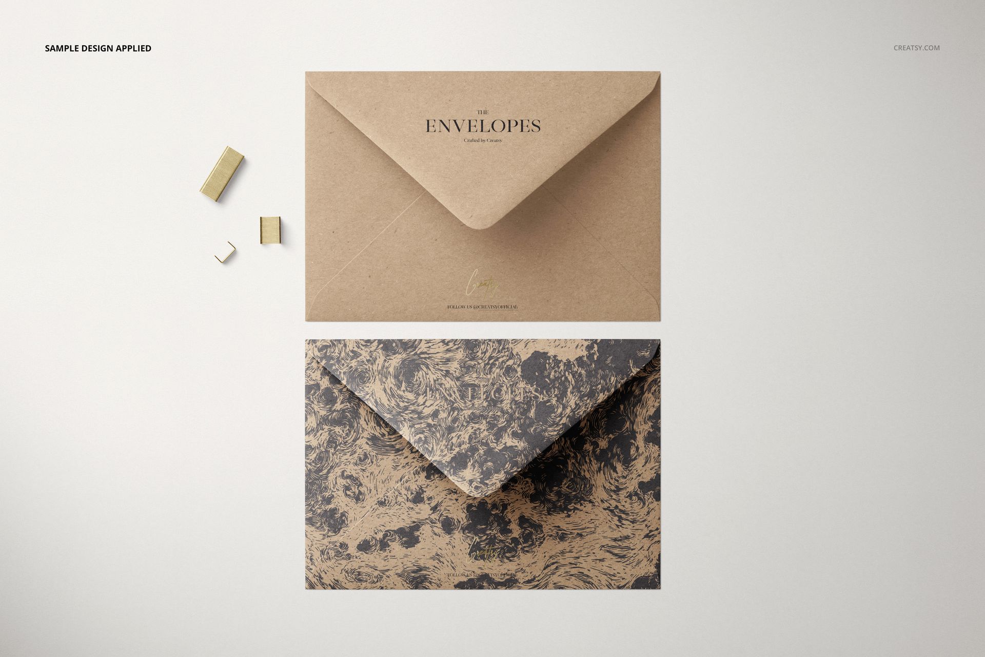 Mockup of C6 kraft paper envelopes, showing a plain brown envelope above a patterned envelope with black and tan swirls.