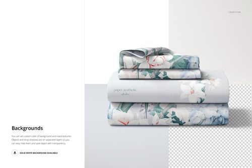 Folded bedding set mockup featuring stacked sheets and pillowcases with a floral pattern on a white surface.