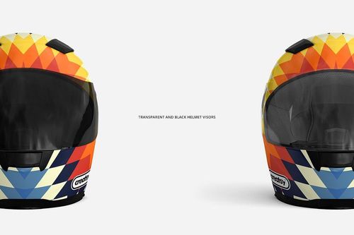 Motorcycle helmet mockup featuring vibrant triangular patterns in orange, yellow, and blue, shown from the front.