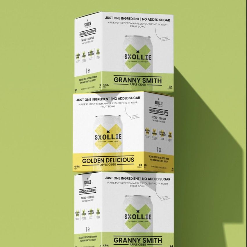 Square box mockup featuring three stacked cider packaging boxes with geometric label designs on a light green background.