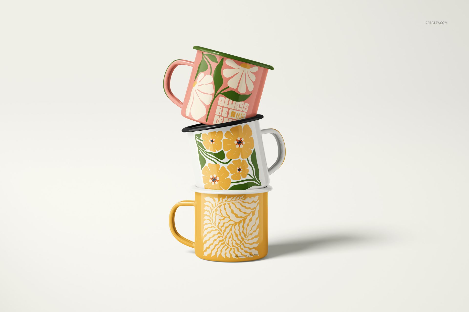 PSD mockup of enamel mugs arranged in a vertical stack, each with distinct floral artwork and pastel colors.