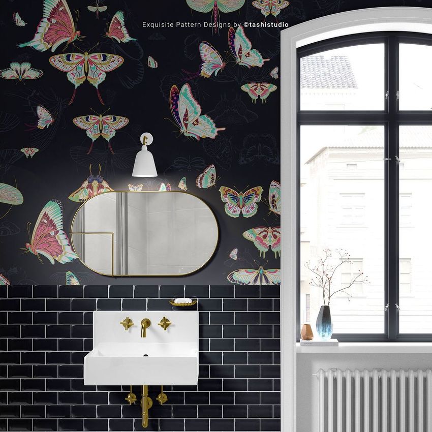 Vintage bathroom mockup featuring a white sink with gold fixtures, dark tile walls, and butterfly patterned wallpaper.