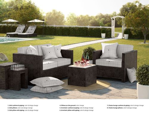 PSD mockup of outdoor rattan seating featuring square and rectangular pillows with subtle grid patterns on a patio.