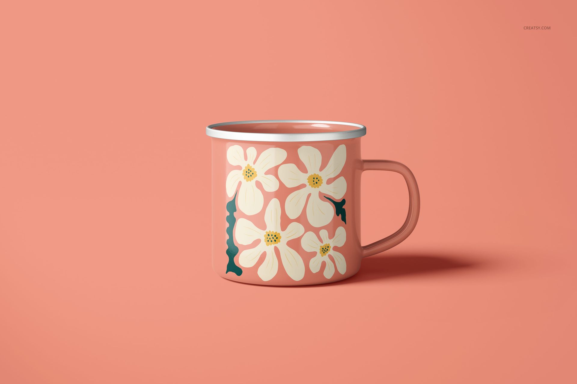 PSD mockup of a 360ml enamel mug with silver rim, decorated with white flowers and displayed on a pink surface.