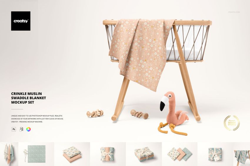 Floral-patterned muslin swaddle blanket mockup displayed on a modern wooden crib, accompanied by a plush flamingo toy.