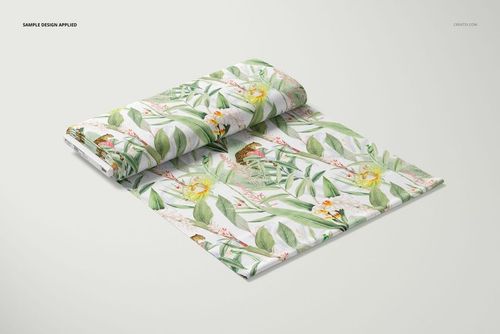 Fabric bolt mockup featuring a folded bolt with tropical leaf and butterfly pattern, displayed on a light background.