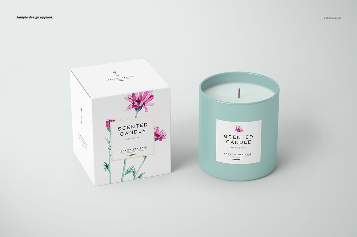 Front view of a classic candle and matching box mockup, both in soft teal with floral label design on a light background.