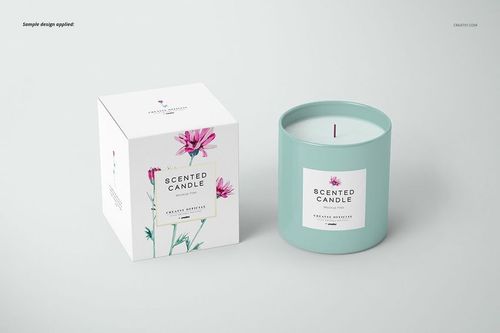 Front view of a classic candle and matching box mockup, both in soft teal with floral label design on a light background.