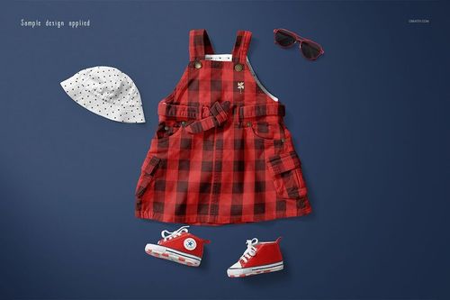 Front view of a baby dress mockup set featuring a red plaid dress, white polka dot hat, red sneakers, and sunglasses on a blue background.