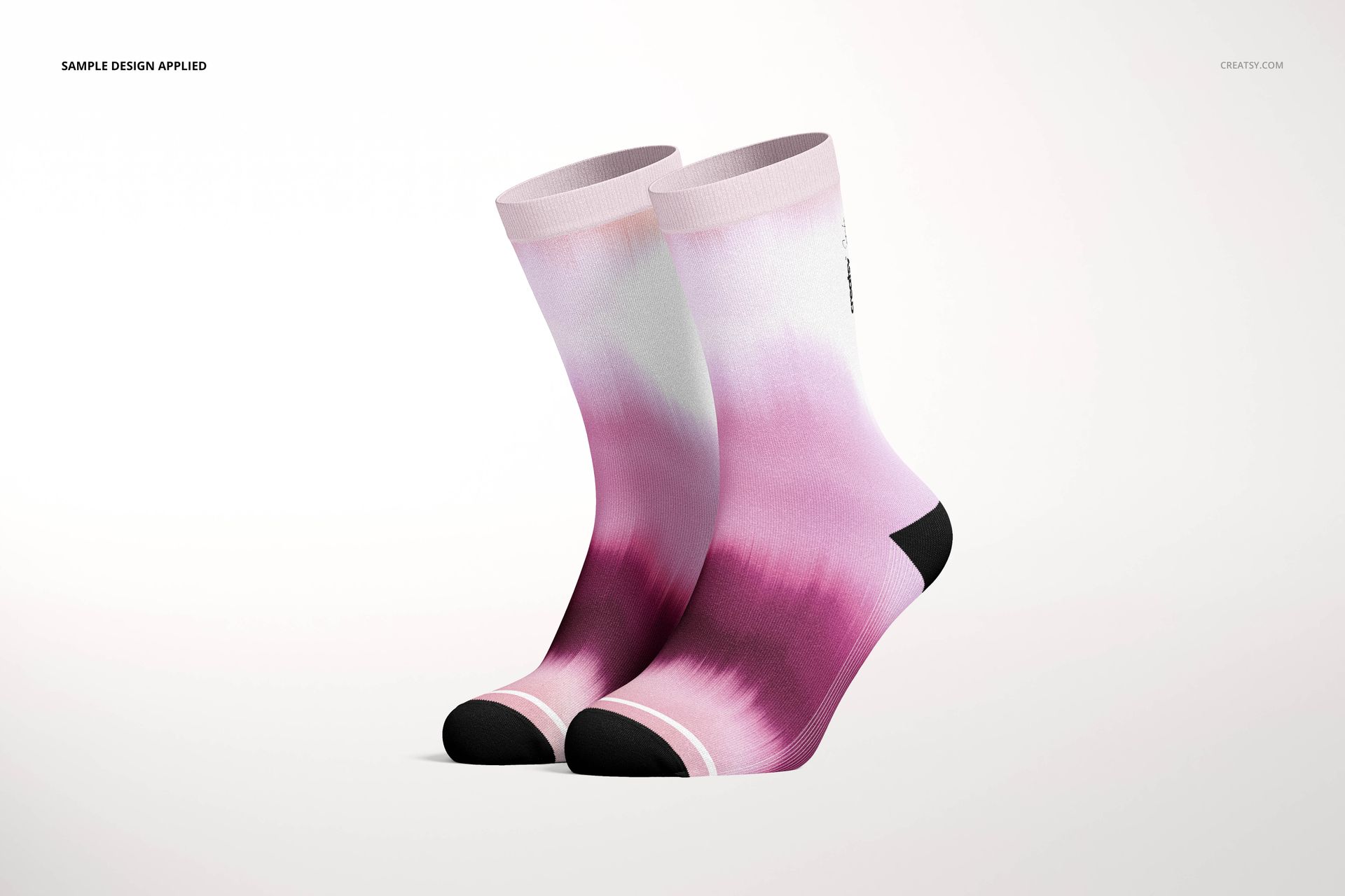 Socks mockup featuring two socks with a soft pink and purple gradient design, shown from a front angle.