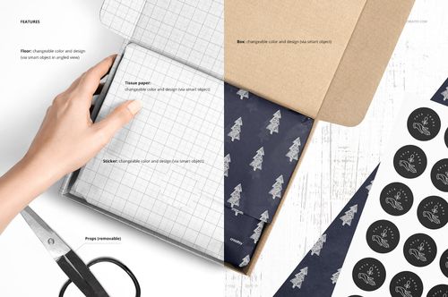 Mailer box packaging mockup with patterned tissue paper, grid wrapping sheet, hand, and black sticker sheets.