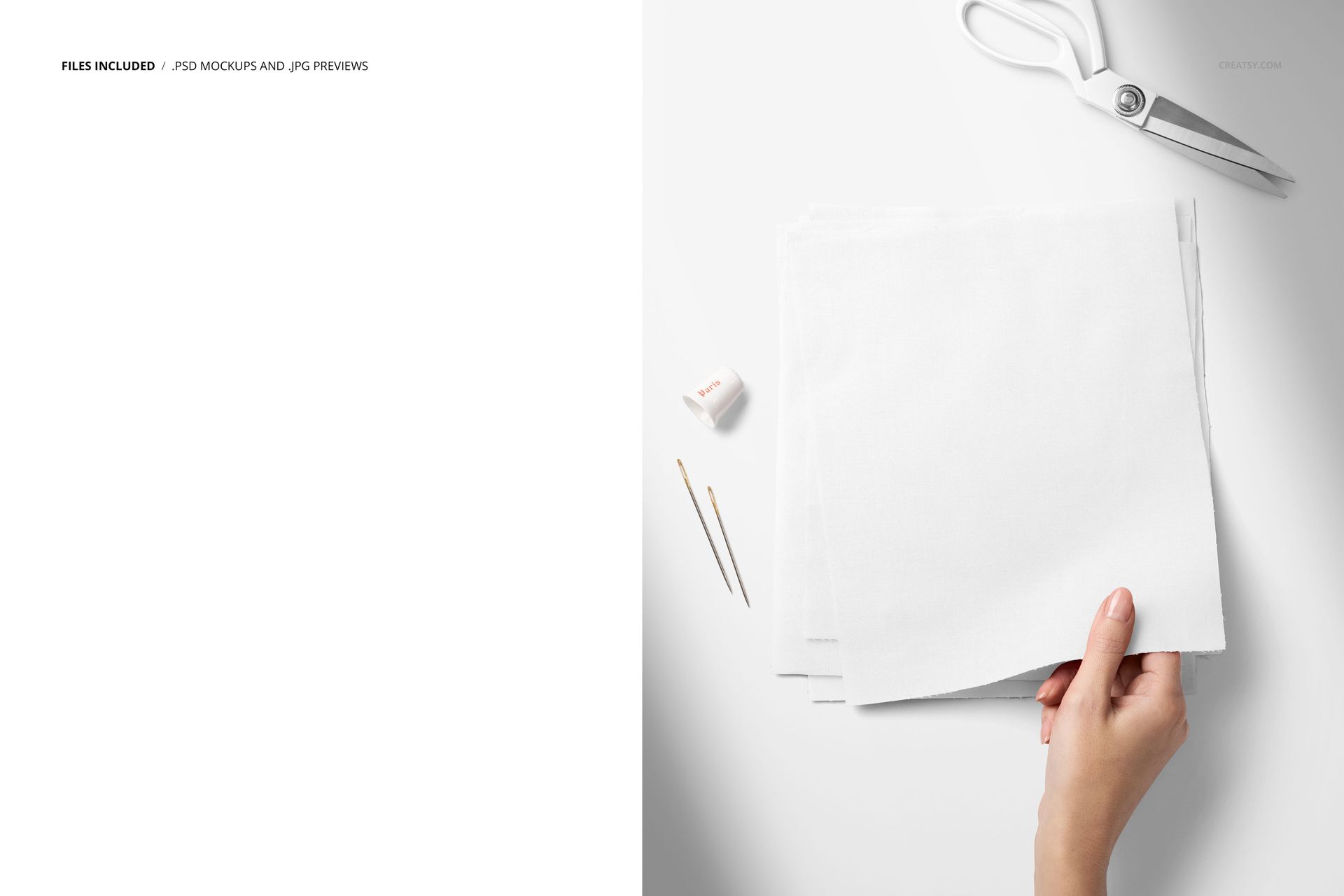 PSD mockup showing a person's hand holding plain fabric swatches, with sewing accessories arranged on a white background.