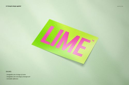 Sticker mockup featuring a green rectangular shape with large pink lettering, shown from a top-down perspective.