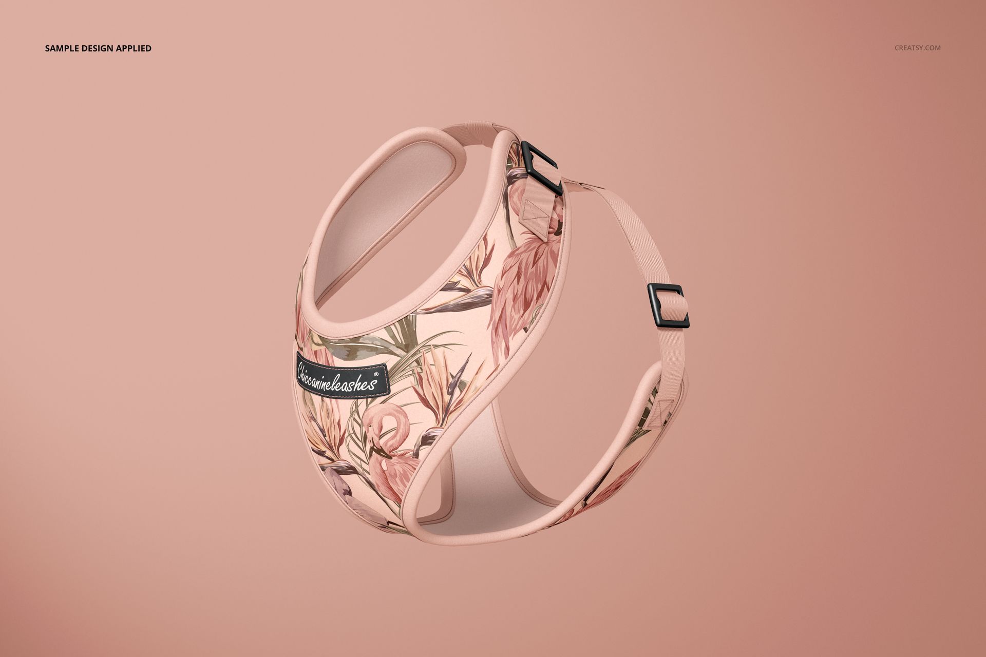 Front angled view of a dog harness mockup featuring a soft pink base with floral and leaf patterns on a plain background.