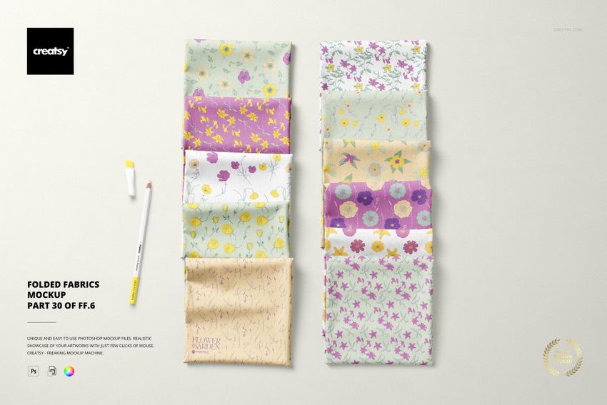 Folded fabrics mockup displaying various pastel and bright colored textile samples with floral and geometric designs.