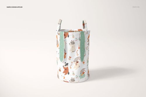 Mockup of a cylindrical kids storage basket featuring playful animal patterns and green accents, front perspective.