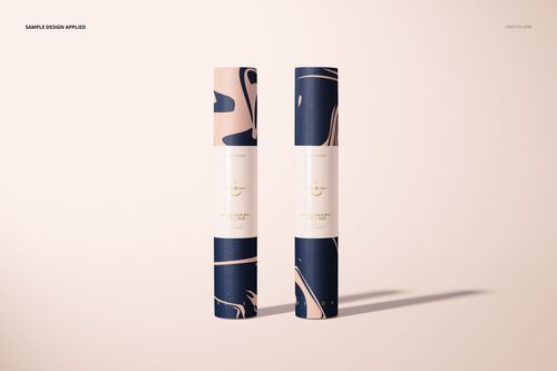 Yoga mat mockup set showing two rolled mats with modern abstract patterns in blue and pink tones, side by side.