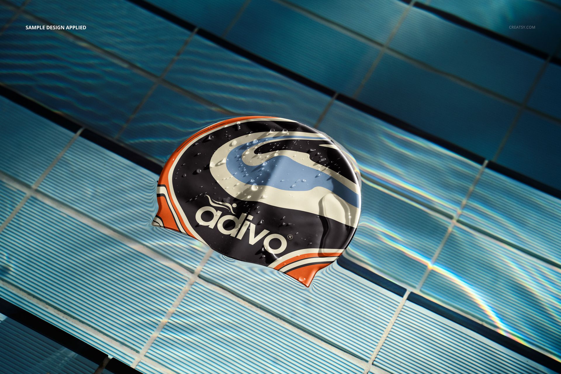 Mockup of a swim cap featuring a bold curved design in black, white, and orange, shown over a tiled pool background.