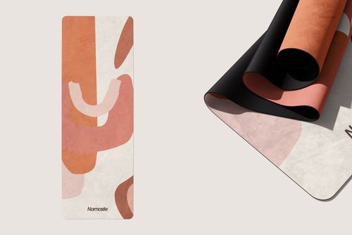 Yoga mat mockup featuring soft suede texture and curved color blocks, presented from overhead and angled perspectives.