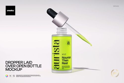 Dropper Laid Over Open Bottle Mockup - mockup preview 1