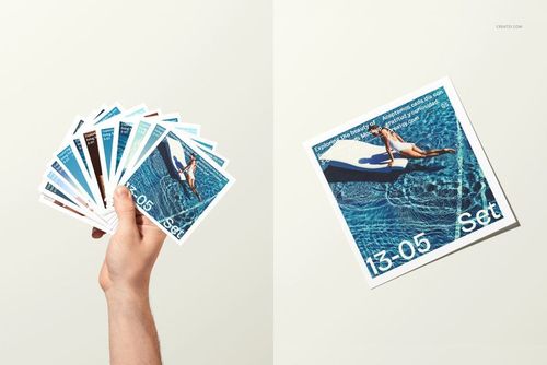 Front view of multiple square photo prints featuring a blue water scene, presented as a PSD mockup on a neutral surface.